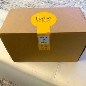 Furbo dog treat and camera. STILL NEW IN UNOPENED BOX!